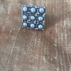 Artistic silver tone adjustable ring